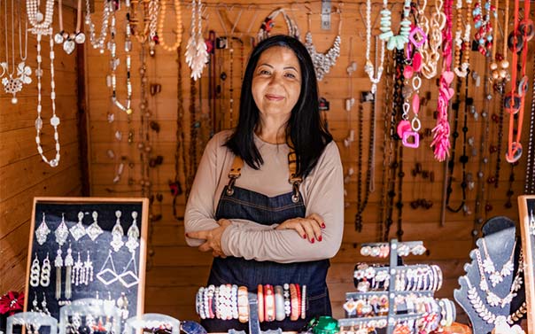 a female entrepreneur selling handcrafted jewelry